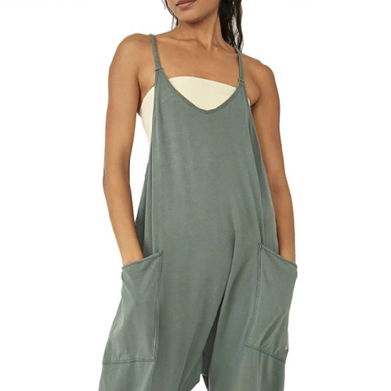 Ensfarget jumpsuit med V-hals slyngelomme