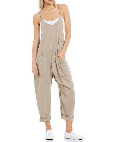 Ensfarget jumpsuit med V-hals slyngelomme