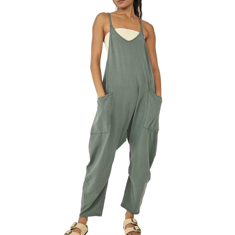 Ensfarget jumpsuit med V-hals slyngelomme