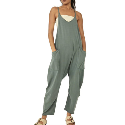 Ensfarget jumpsuit med V-hals slyngelomme